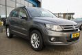 Volkswagen Tiguan - 1.4 TSI Sport&Style Navigatie , Trekhaak(wegklapbaar) Clima - 1 - Thumbnail