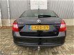 Skoda Rapid - 1.2 TSI Greentech Comfort Go 2013 / Airco / Cruisecontrol / 1e eigenaar / Dealeronderh - 1 - Thumbnail