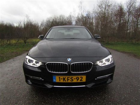 BMW 3-serie - 320i NAVI | LEDER | DEALERONDERH. | 1e EIGENAAR - 1