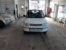 Daihatsu Cuore - 1.0-12V XTi