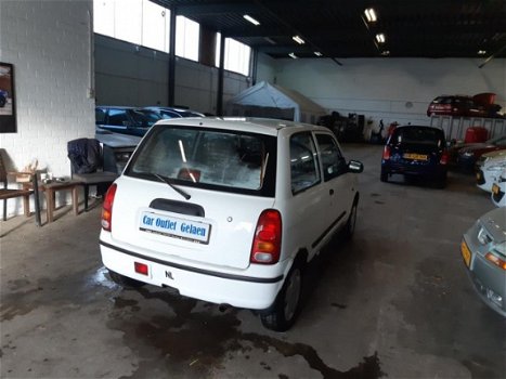 Daihatsu Cuore - 1.0-12V XTi - 1