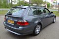 BMW 5-serie Touring - 523i AUTOMAAT / AIRCO / CRUISE / LMV / NIEUWE APK - 1 - Thumbnail