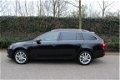 Skoda Octavia Combi - 1.6 TDI Elegance AUTOMAAT | LEDER | PANO-DAK | NAVI - 1 - Thumbnail