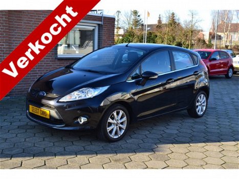 Ford Fiesta - 1.4 Titanium 5.Drs 1e eigenaar bj2009 82.000 km airco lm.velgen parkeersensoren el.ram - 1