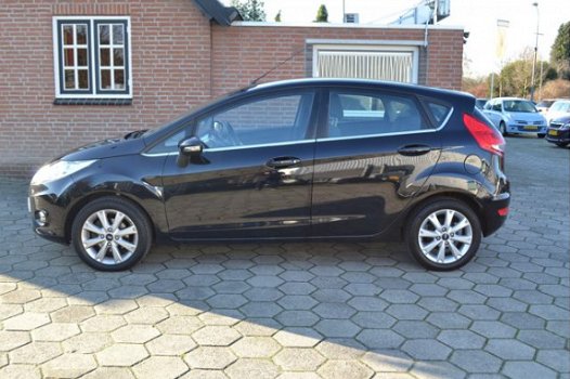 Ford Fiesta - 1.4 Titanium 5.Drs 1e eigenaar bj2009 82.000 km airco lm.velgen parkeersensoren el.ram - 1