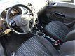 Opel Corsa - 1.2 16V 111 Edition Airco Cruise Navi LM 105.460km - 1 - Thumbnail