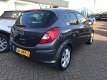 Opel Corsa - 1.2 16V 111 Edition Airco Cruise Navi LM 105.460km - 1 - Thumbnail