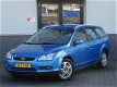 Ford Focus Wagon - 1.6-16V Ghia APK 07-2020 (bj2006) - 1 - Thumbnail