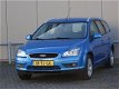 Ford Focus Wagon - 1.6-16V Ghia APK 07-2020 (bj2006) - 1 - Thumbnail