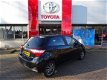Toyota Yaris - 1.5 Hybrid Dynamic / Navigatie / Bluetooth / Keyless Entry / Lichtmetalen Velgen / Mi - 1 - Thumbnail