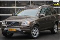 Volvo XC90 - 2.4 D4 FWD Momentum 7-persoons Leder Navigatie Automaat 3-6-12 M Garantie - 1 - Thumbnail