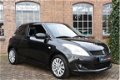 Suzuki Swift - 1.2 Bandit EASSS 38.383KM 2012 AIRCO CRUISE 1e EIGENAAR LM Velgen - 1 - Thumbnail