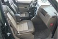 Jeep Patriot - 2.0 CRD Limited Airco/Cruise/Leder - 1 - Thumbnail