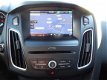 Ford Focus Wagon - 1.0 Titanium 125pk NAVI, Clima, PDC, stoel+stuur warming, - 1 - Thumbnail