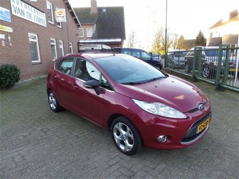 Ford Fiesta - 1.25 Titanium / airco-ecc / cruise / 5 drs / lmv / navi / pdc / metallic-lak - 1