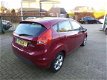 Ford Fiesta - 1.25 Titanium / airco-ecc / cruise / 5 drs / lmv / navi / pdc / metallic-lak - 1 - Thumbnail