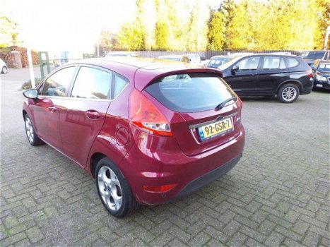 Ford Fiesta - 1.25 Titanium / airco-ecc / cruise / 5 drs / lmv / navi / pdc / metallic-lak - 1