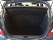 Opel Corsa - 1.4i-16V 90pk 5D. AC|Cr.Control|Navi|Bluetooth|PDC|LMV|Winterwielenset - 1 - Thumbnail