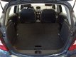 Opel Corsa - 1.4i-16V 90pk 5D. AC|Cr.Control|Navi|Bluetooth|PDC|LMV|Winterwielenset - 1 - Thumbnail