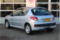 Peugeot 206 - 1.4 | XS | Airco | Cruise | Trekhaak | Dealer auto | Parrot - 1 - Thumbnail