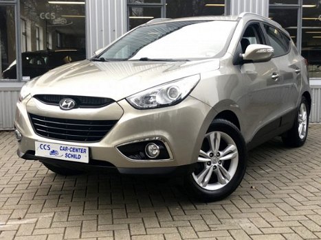 Hyundai ix35 - 2.0i NAVI, CAMERA, CRUISE, HALF LEDER, TREKHAAK, 163 PK - 1