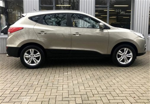 Hyundai ix35 - 2.0i NAVI, CAMERA, CRUISE, HALF LEDER, TREKHAAK, 163 PK - 1