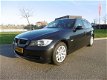 BMW 3-serie Touring - 320i High Executive Airco, Navigatie - 1 - Thumbnail