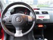 Suzuki Swift - 1.3 Bandit / Keyless / Lmv / Airco - 1 - Thumbnail