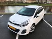 Kia Rio - 1.2 CVVT DynamicLine Navigator CLIMA PDC CAMERA NAP - 1 - Thumbnail