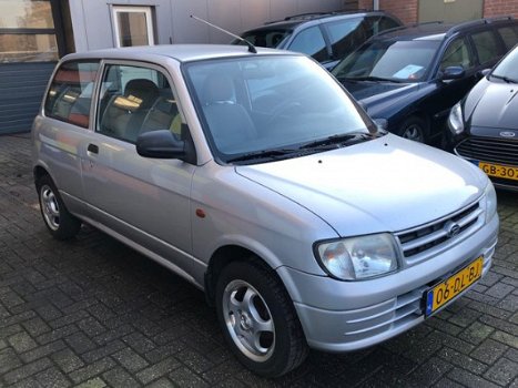 Daihatsu Cuore - 1.0-12V XTi - 1