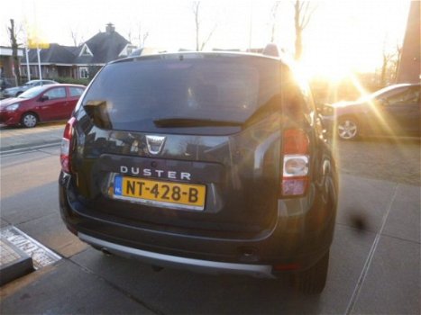 Dacia Duster - Prestige 1e Eig. AIRCO/NAVI/CRUISE/PDC/a.u.r.camera/LEER - 1