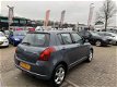 Suzuki Swift - 1.3 4Grip Exclusive Airco Elek. Pakket 5 Drs - 1 - Thumbnail