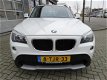 BMW X1 - SDrive18i Executive Navigatie PDC * 106.292km - 1 - Thumbnail