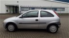 Opel Corsa - 1.2-16V Comfort - 1 - Thumbnail