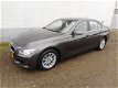 BMW 3-serie - 320i High Executive automaat - 1 - Thumbnail