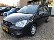 Kia Carens - 2.0 CVVT X-tra 7p - 1 - Thumbnail