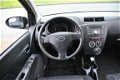 Daihatsu Cuore - 1.0 Premium 5 deurs stuurbekrachtiging Nieuwe APK - 1 - Thumbnail