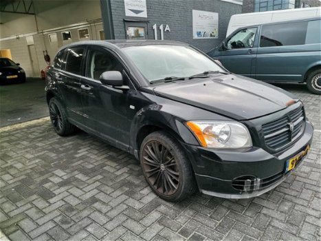 Dodge Caliber - 2.0 SE AUTOMAAT ( LICHTE SCHADE ) - 1