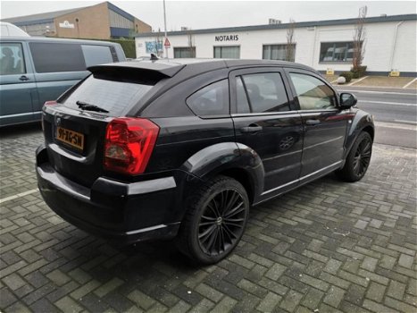 Dodge Caliber - 2.0 SE AUTOMAAT ( LICHTE SCHADE ) - 1