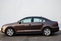 Volkswagen Jetta - 1.4 TSi Hybrid DSG Comfortline | Navi | Clima | Cruise | Trekhaak | 16'' LMV | De - 1 - Thumbnail