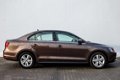 Volkswagen Jetta - 1.4 TSi Hybrid DSG Comfortline | Navi | Clima | Cruise | Trekhaak | 16'' LMV | De - 1 - Thumbnail