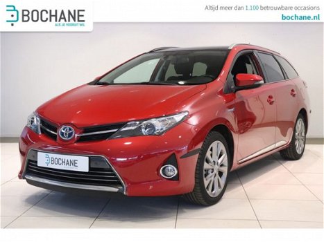 Toyota Auris Touring Sports - 1.8 Hybrid Executive LAGE KMSTAND | Clima | Navi | Stoelverw. | Pan. D - 1