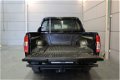 Nissan Navara - 2.5 dCi 145 pk 5 persoons grijs kenteken (5th wheeler) Trekhaak/LM/Airco/4WD/4X4 - 1 - Thumbnail