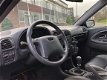 Volvo V40 - 1.8 2002 Airco Cruise control NAP - 1 - Thumbnail