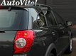 Chevrolet Captiva - 2.0 VCDI Executive Aut. 7-Persoons, Navi, ECC, Opendak, Trekhaak - 127.000km - 1 - Thumbnail