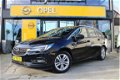 Opel Astra Sports Tourer - 1.4i Turbo Online Edition 150pk pdc / navi / trekh. / erg. comfort stoele - 1 - Thumbnail