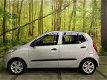 Hyundai i10 - 1.1 i-Drive Cool Airco Elek. Ramen en Spiegels CV Afstand Radio.CD - 1 - Thumbnail