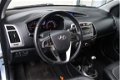 Hyundai i20 - 1.2i i-Catcher (AIRCO/LMV/CRUISE CONTROL/PDC/CAMERA) - 1 - Thumbnail