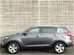 Kia Sportage - 1.6 GDI X-ecutive Plus Pack | Climate Control | Cruise Control | LM-Velgen | Dakrails - 1 - Thumbnail