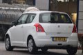 Suzuki Swift - 1.3 Comfort - zo meeneemprijs met nw APK - 1 - Thumbnail